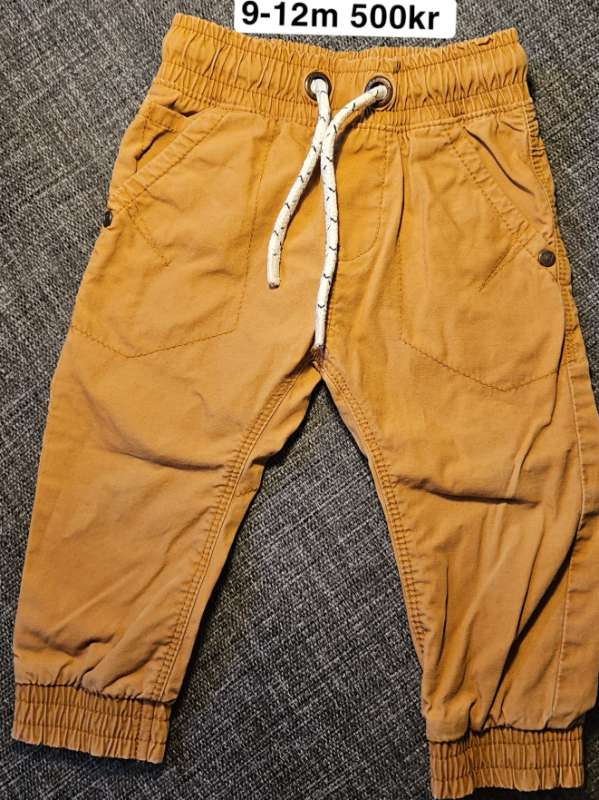 Brúnar buxur 9-12m