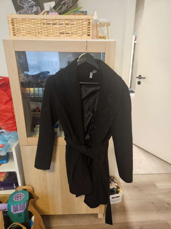 Svört kápa EÞC