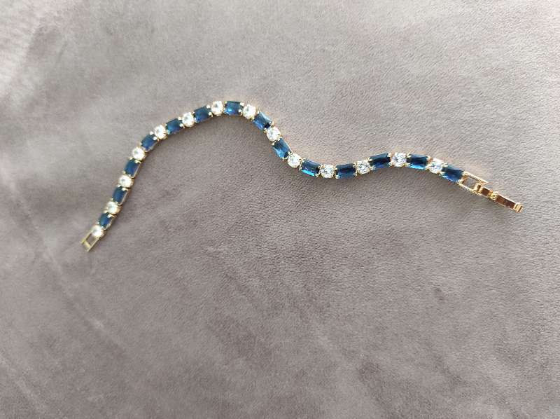 Armband krystaladeins gull rotfytl.stal