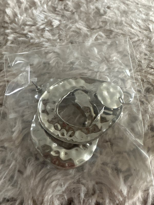 Silver irregular circles