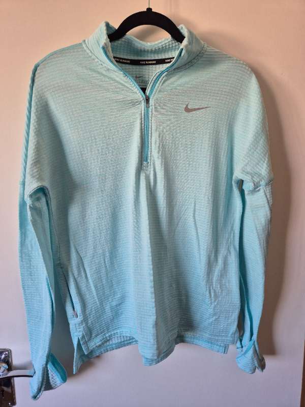 Nike blá peysa
