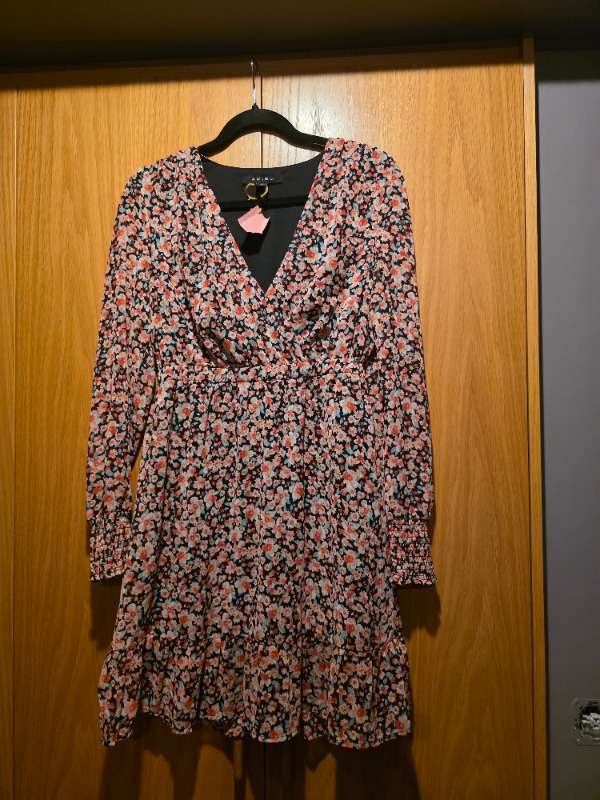 Bleikur blómakjóll