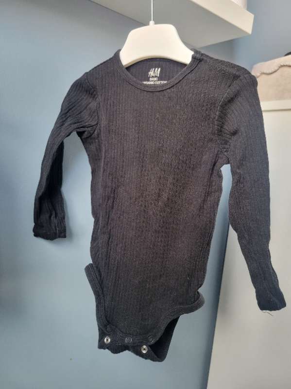 H&M svört samfella 80