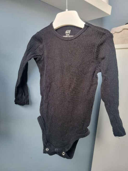 H&M svört samfella 80