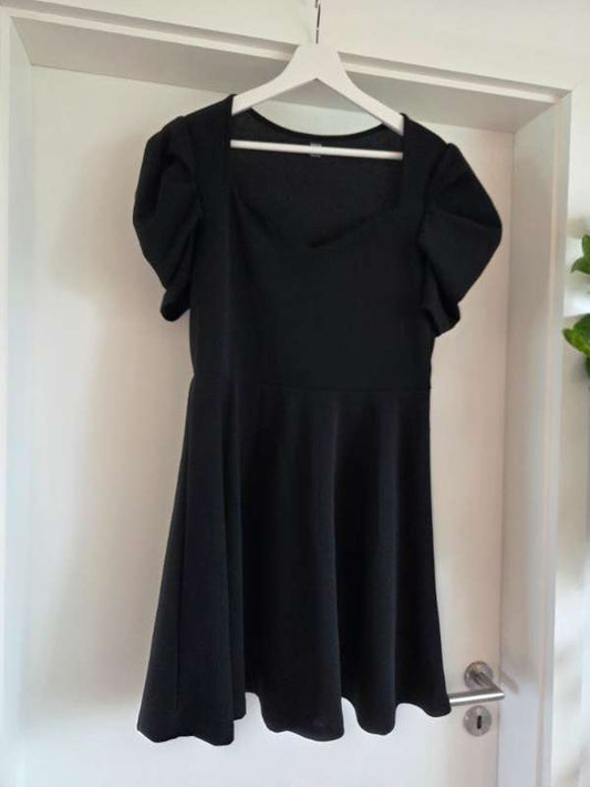 Black short-sleeved dress, unworn