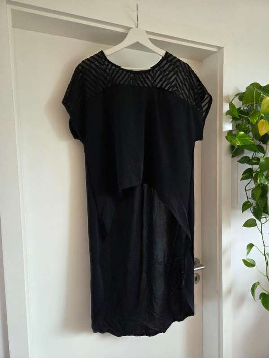 Black top longer at the back