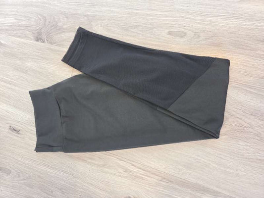 Black running tights with mesh