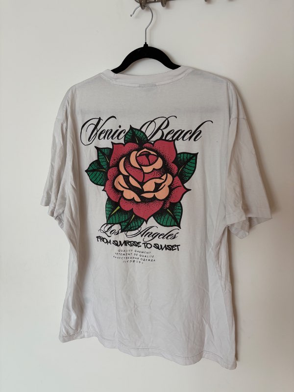 H&M hvítur bolur m/rós