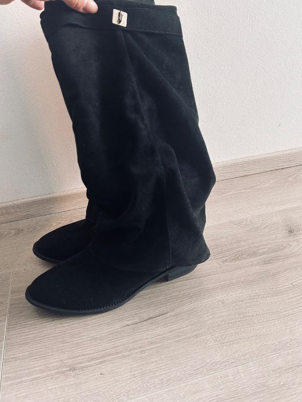 Svört stigvel