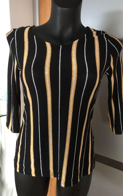 Röndóttur gylltur bolur