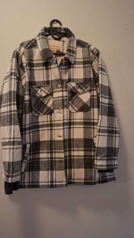 Köflóttu jakki onotaður