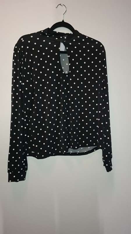 Doppóttur langerma bolur.