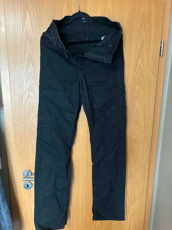 Svartar gallabuxur Tall ÓNOTAÐ