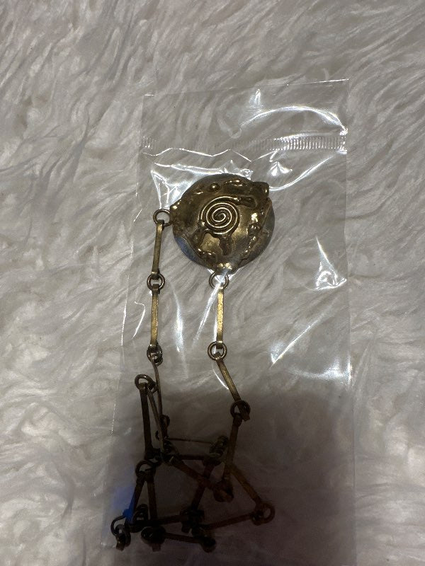Golden necklace disc