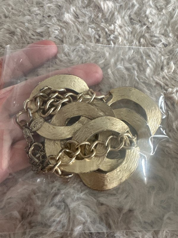 Gold necklace many circles