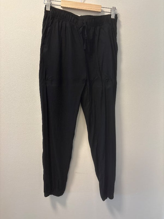 Uniqlo svartar buxur með teygju neðst