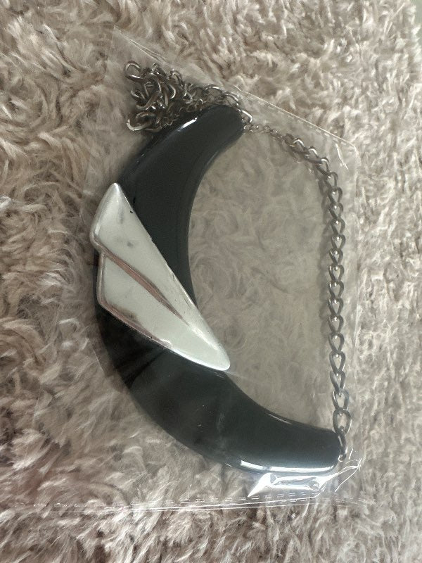 Black and small silver necklace